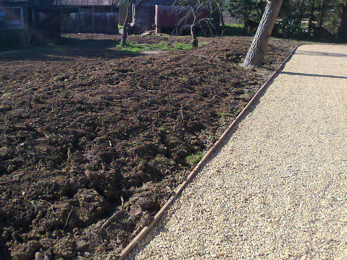 image showing soil grading up to driveway