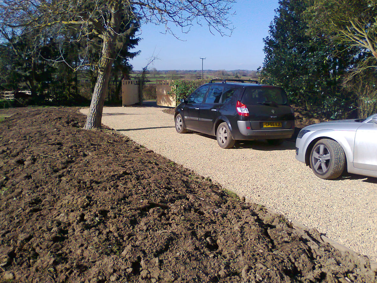 Showing timber edging on driveway